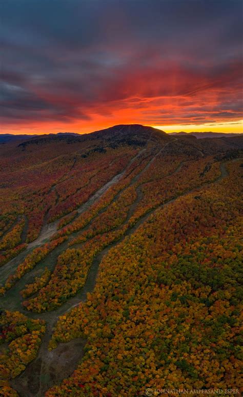 Gore Mountain Ski Area trails sunset behind summit during Harvestfest - vertical ...