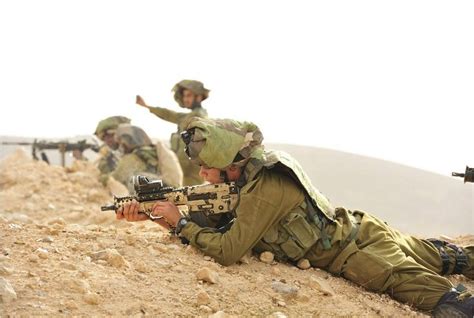 Givati Brigade soldiers tasked with protecting Israels northern border training in the Gola ...