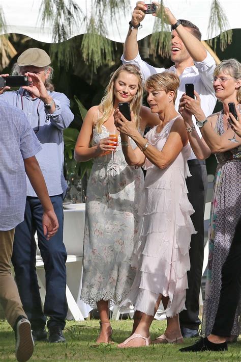 Margot Robbie at friends wedding in Kauai -02 | GotCeleb