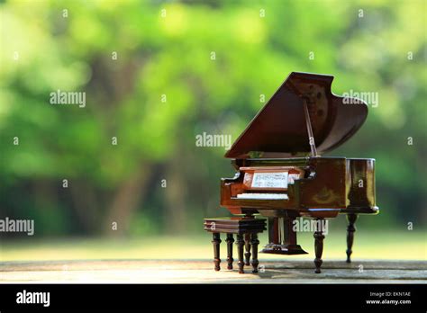 Miniature piano in nature Stock Photo - Alamy