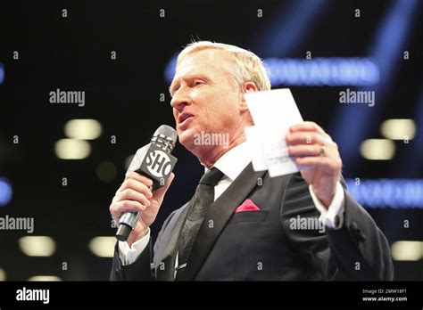 Ring announcer Jimmy Lennon Jr. introduces a fighter before a boxing match on Saturday, April 22 ...