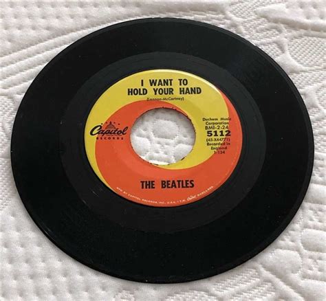 Lot Detail - The Beatles Rare 45 RPM "I Saw Her Standing There/I Want ...