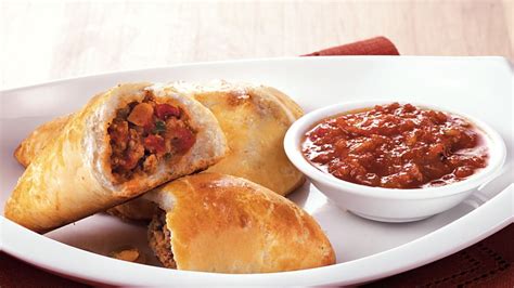 Pork Picadillo Empanadas recipe from Pillsbury.com