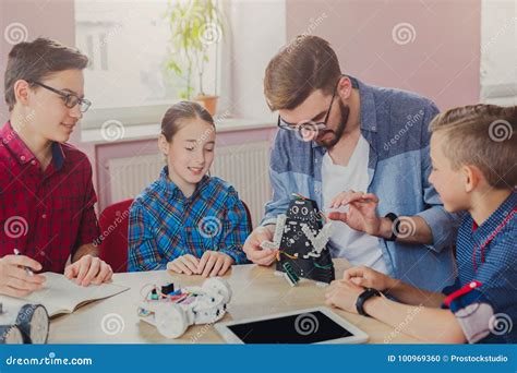 Stem Education. Kids Creating Robots with Teacher Stock Photo - Image of children, equipment ...