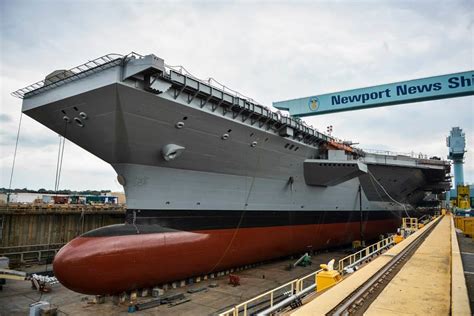 Beautiful picture of the USS Ronald Reagan in vivid blue waters during RIMPAC June 23, 2014 ...