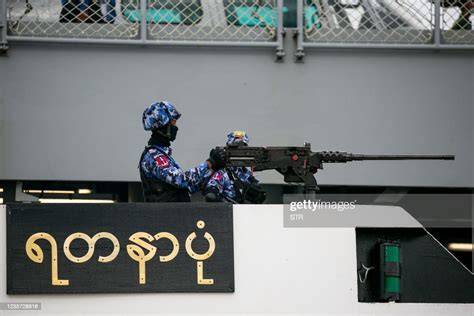 A member of the Myanmar navy stands guard during the inauguration of... News Photo - Getty Images