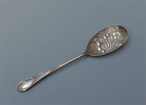 ANTIQUE SILVER PLATED BERRY SPOON