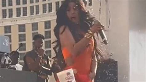 Cardi B hurls mic at fan after being splashed with drink on stage | Entertainment