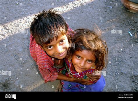 portrait or close up shot of two indian street kids with innocence in ...