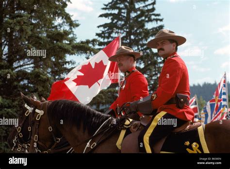 Canadian Mounties (RCMP) Royal Canadian Mounted Police Officers on Horseback and wearing ...