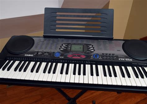 Casio Electronic Keyboard and Stand | EBTH