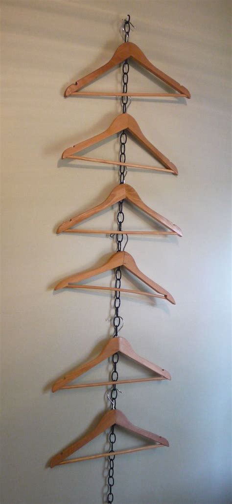 Cottage Living: How to Hang Clothes When You Don't Have a Closet | Shop display, Boutique ...