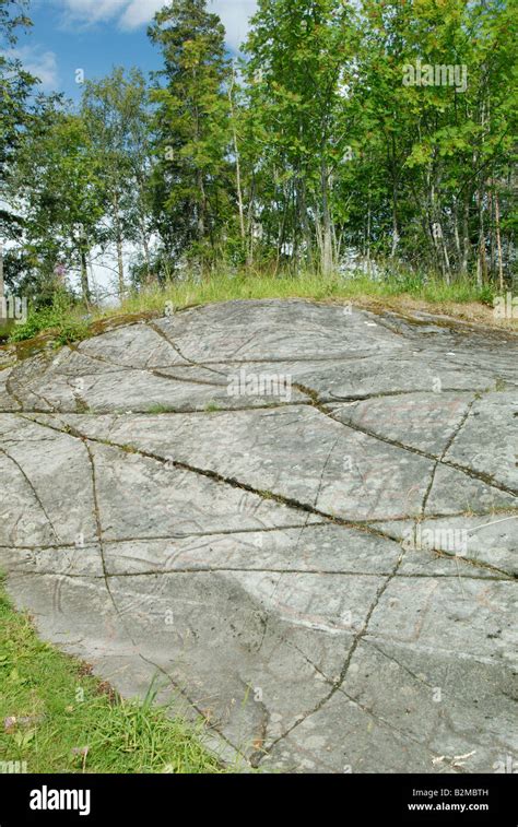 Norwegian rock carvings Stock Photo - Alamy