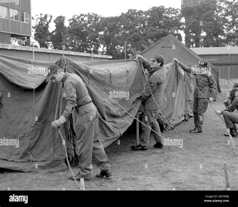 Medical specialists of the 48th Tactical Fighter Wing set up a tent for a mobile hospital during ...