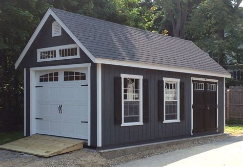 The bold shutters look nice on this 12x24 Garden Manor Cape Garage. # ...