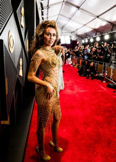 Miley Cyrus Wins First Two Grammys After Wowing on the Red Carpet