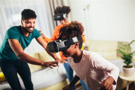 Family Playing Video Games with VR Glasses Stock Photo - Image of ...