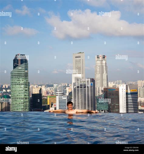 Sands SkyPark infinity swimming pool on the 57th floor of Marina Bay Sands Hotel, Marina Bay ...