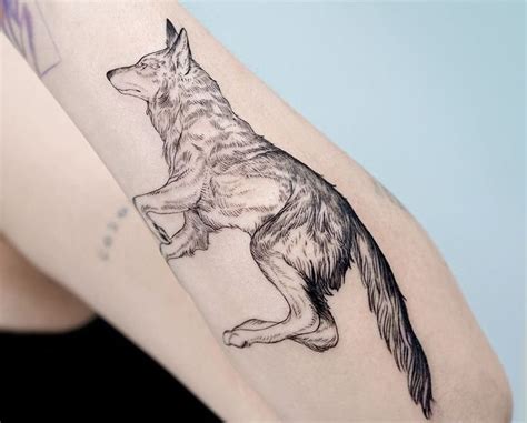 Coyote tattoo, Tattoos, Geometric tattoo arm