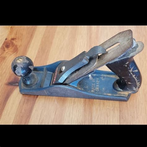 I found and restored this hand plane. I need help identifying it. It is missing the depth screw ...