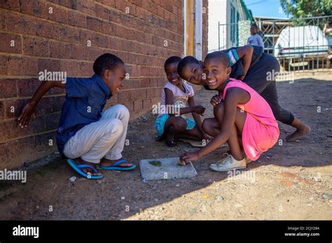 Children playing township south africa hi-res stock photography and ...