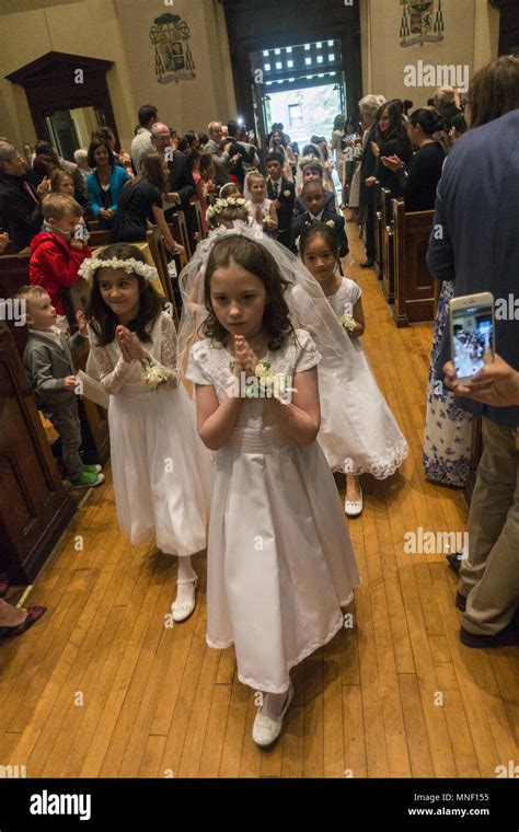 First Holy Communion ceremony for children at a Catholic Church in Brooklyn, New York Stock ...