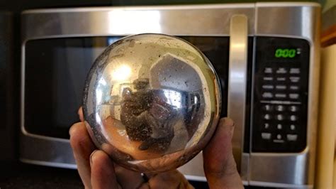 Making a Polished Aluminum Foil Ball in a Microwave. Microwaving ...