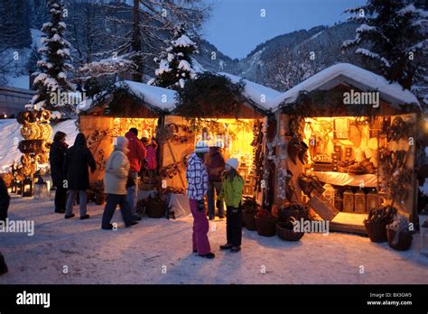 christmas market in Ettal, Germany, with shop for gifts, presents and decoration at cold winter ...