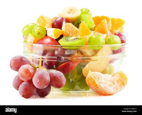 Fruit salad bowl isolated on white Stock Photo - Alamy