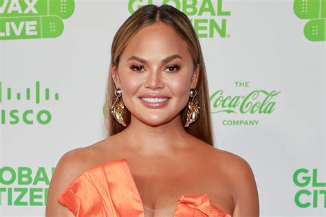 Chrissy Teigen teases bold red hair transformation