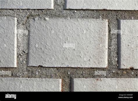 Silver painted brick wall Stock Photo - Alamy