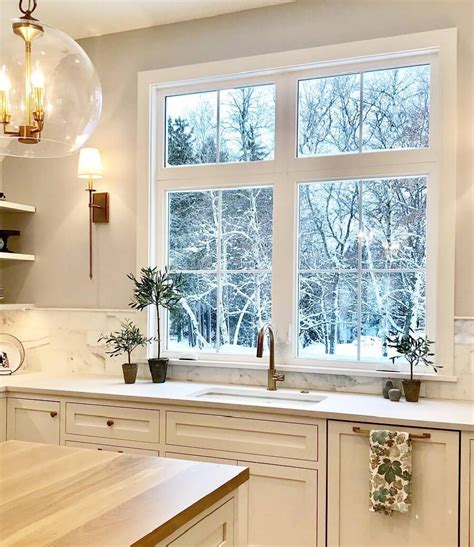 White Casement Windows Brighten Farmhouse Style Kitchen | Pella