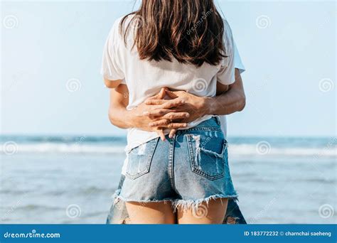 Romantic Couple Having Love and Hug on the Beach Stock Photo - Image of ...