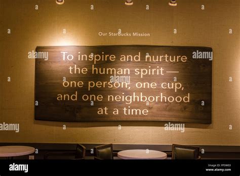 Mission statement sign inside the Starbucks corporate headquarters Stock Photo, Royalty Free ...