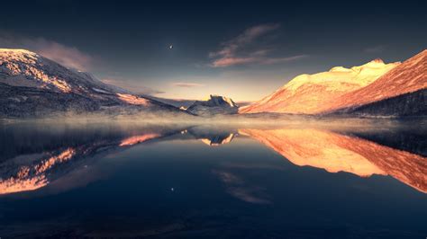 Calm lake surrounded by snow covered mountains 8K Wallpaper