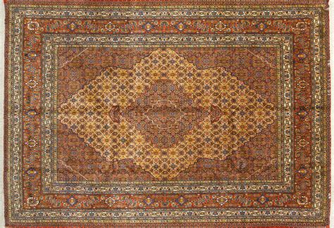 Lot - A Persian Hand Knotted Ardebil Carpet, 314 x 220