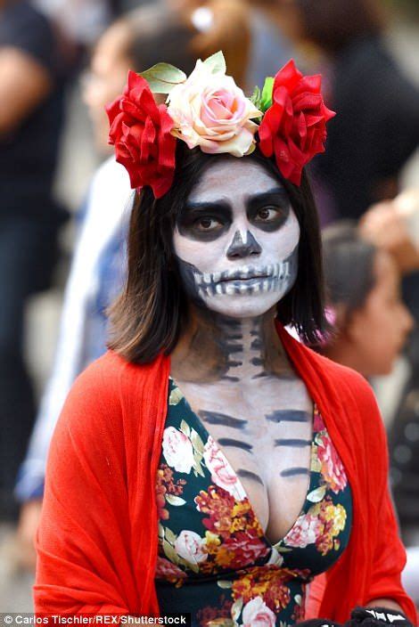 Participants are seen during the traditional 'Day of the Dead' parade ...