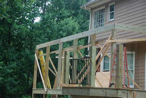 Decks.com. Building a shed roof over a deck