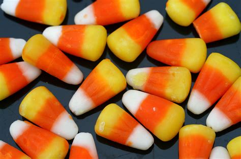 File:Candy corn strewn on a black background.jpg - Wikimedia Commons