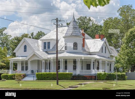 Restored old victorian house with a full wrap around front porch in ...