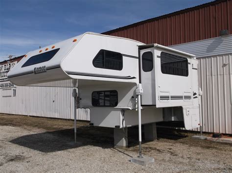 2002 Lance Cabover Slide-In Pick Up Camper- 6' Slide Out- Side Door- Gas- Electric Fridge- Microwave