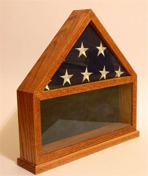 a wooden case with an american flag in the center and stars on the side,