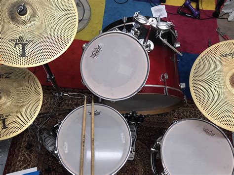 Got my practice set up sorted. Full set of Remo silent stroke heads plus the Zildjian L80 cymbal ...