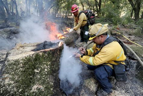 Kincade Fire: Evacuation orders lifted as firefighters gain ground ...