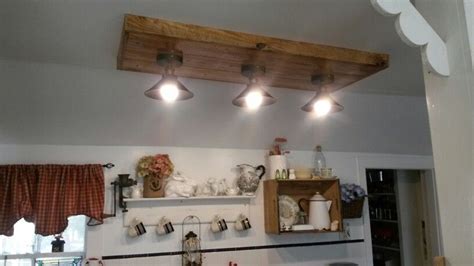 My husband made me a new light fixture for my farmhouse kitchen ...