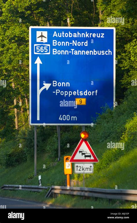 German autobahn direction signs Germany Europe with queueing traffic ...