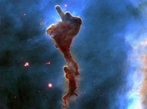 The universe is trying to tell us something. A Bok globule within the Carina Nebula, nicknamed ...