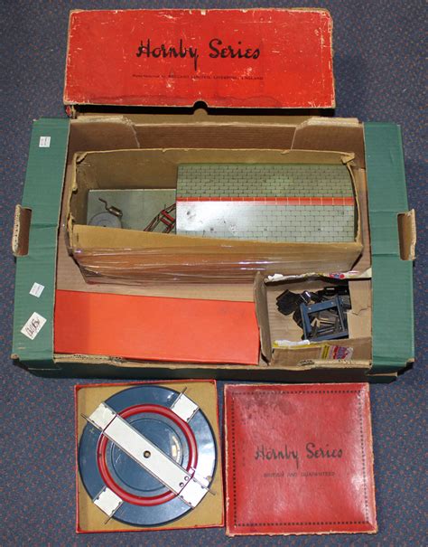 A collection of Hornby Series and Hornby gauge O accessories, including a goods platform with crane,