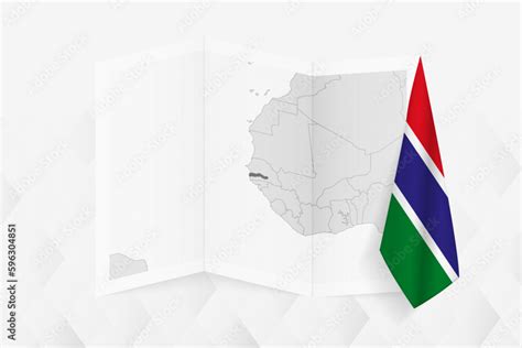 A grayscale map of Gambia with a hanging Gambian flag on one side ...