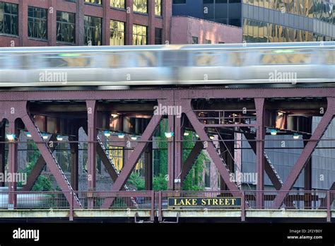 Chicago, Illinois, USA. A Chicago CTA Green Line train streaking across ...